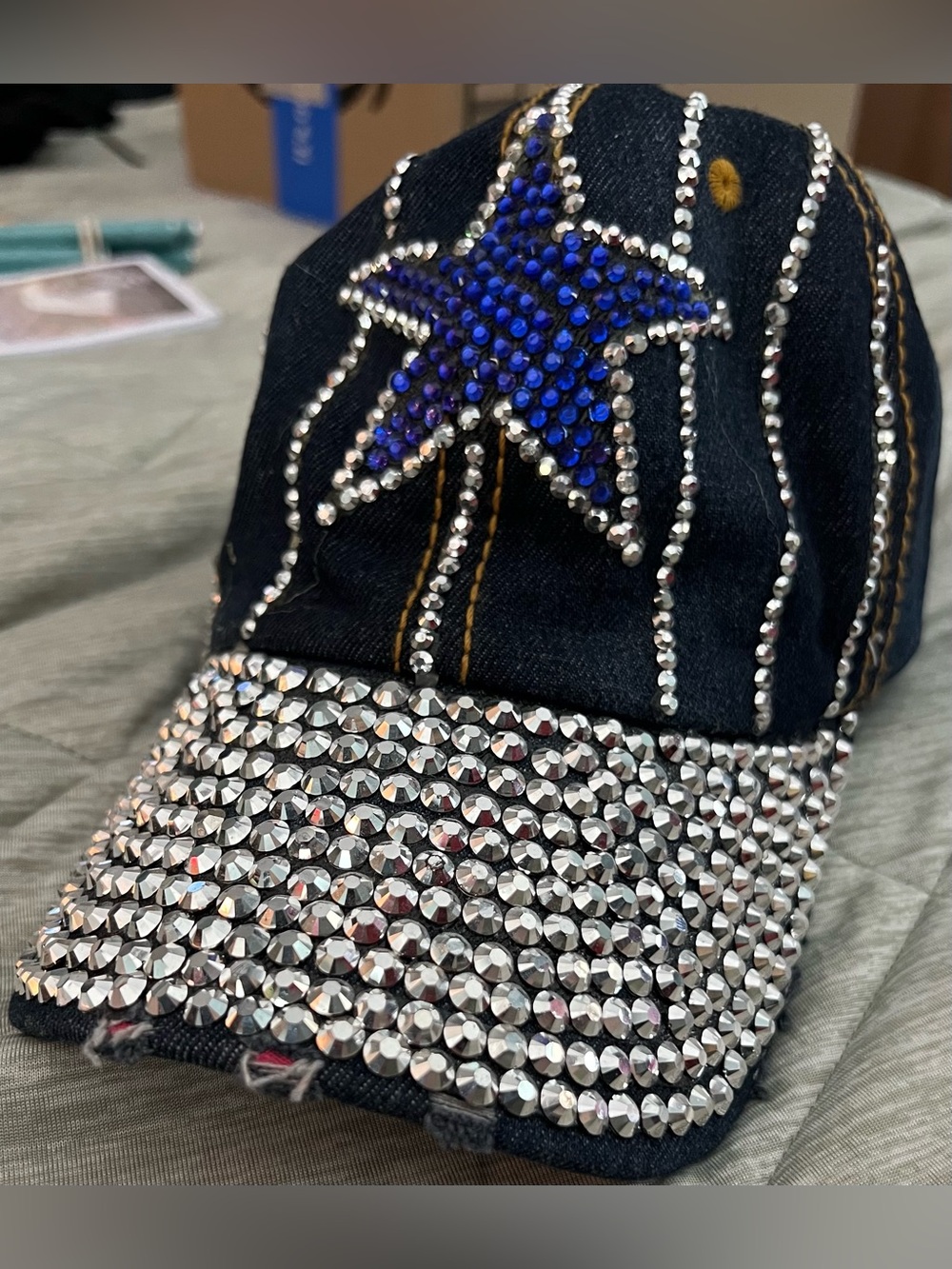 Rhinestone Embellished Distressed Denim Cap with Blue Star